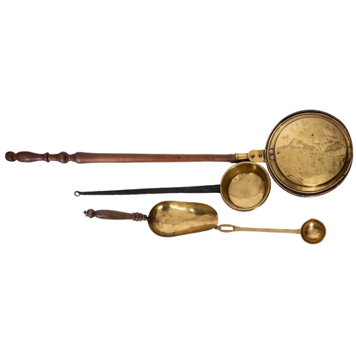 310 - A copper and brass warming pan, together with a brass skillet pan, a brass ladle, and a beech-handle... 