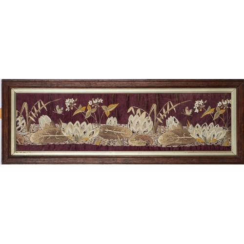 323 - A Victorian gros point needlework picture, depicting a bouquet of floral foliage, 45cm x 53cm in a b... 