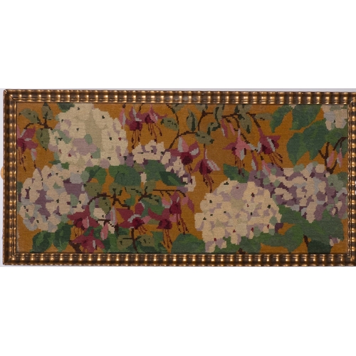 323 - A Victorian gros point needlework picture, depicting a bouquet of floral foliage, 45cm x 53cm in a b... 