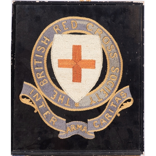 325 - An early 20th century needlework Regimental crest 'The Queen's', 28cm x 34cm, together with another ... 