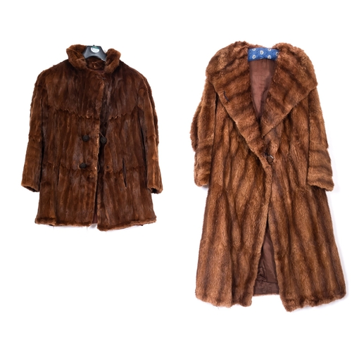 335 - A mid 20th century fur coat, and a similar fur jacket.