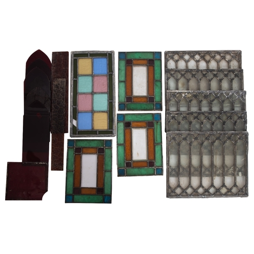 371 - A collection of various leaded glass panels and six ruby tinted glass 'Gothic' pointed arch panel in... 