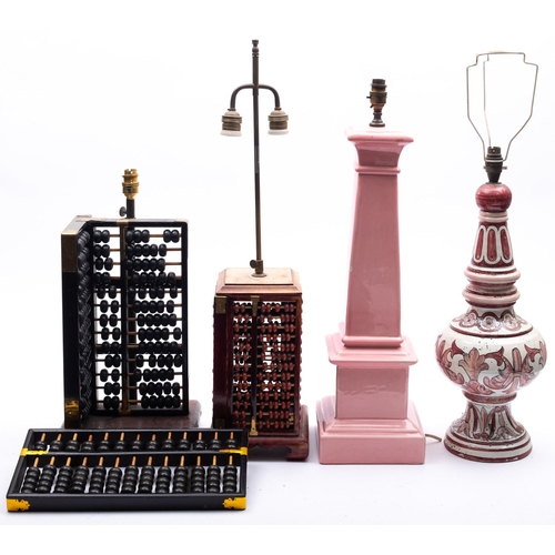 372 - Two abacus wood contemporary table lamps, a pink glazed pottery column table lamp and a Continental ... 