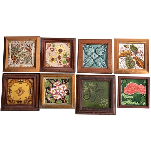 411 - A collection of eight Staffordshire pottery glazed tiles with floral foliate decoration, each within... 