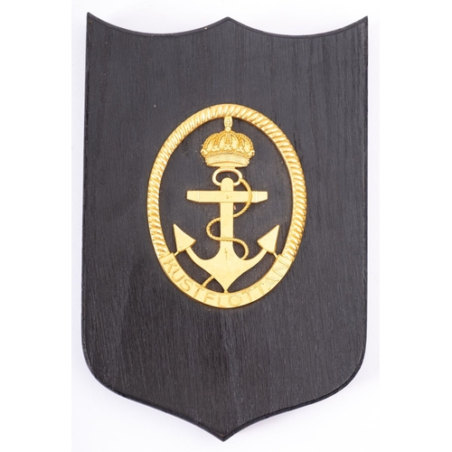 152 - A Scandinavian wardroom badge for the Kustflottan (Coastal Fleet): gilt on ebony plinth, 19cm high