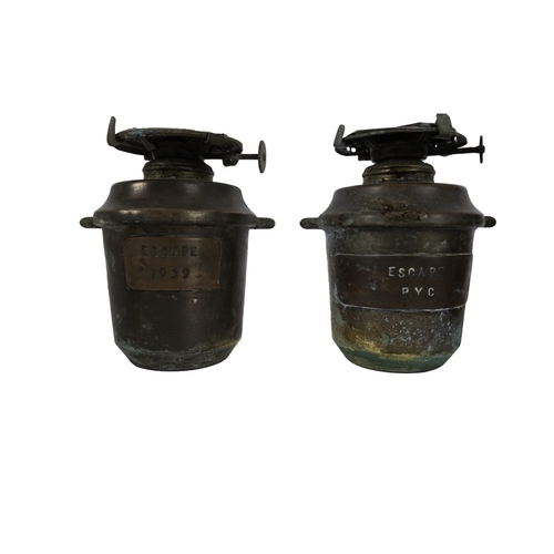 163 - A pair of copper and brass yacht cabin oil lamps from the 'Escape', 1939: glass chimneys over copper... 