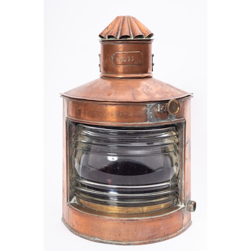 170 - A late Victorian ship's  Port copper lamp the fluted chimney stamped 'O.D 15' over body with red fil... 
