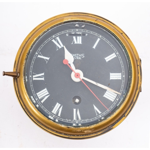 170A - A Smiths  'Astral'  submarine brass bulkhead clock, with black dial , red sweep seconds and Roman nu... 