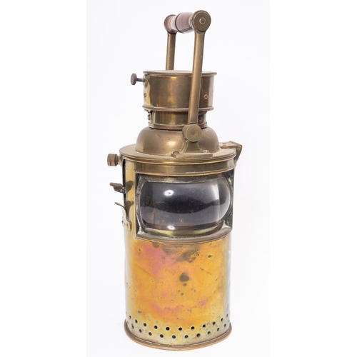 182 - A  WWI period circular brass signal lantern, maker E G & S, dated 1918  turned wooden swing handle o... 