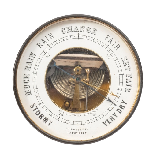 185A - An early 20th century brass aneroid barometer for 'Lennie Optician. Edinburgh', central visible drum... 
