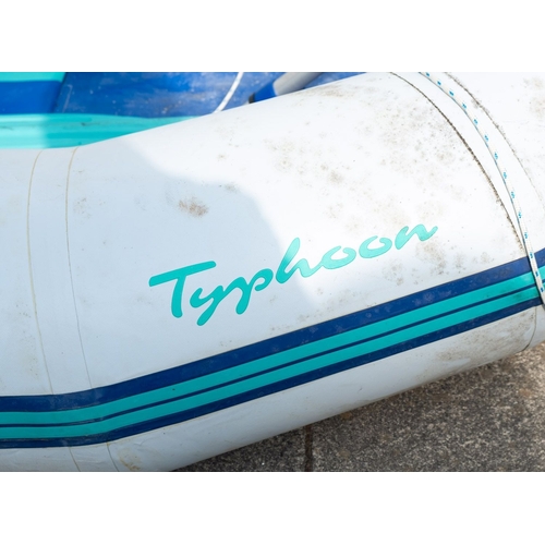 193 - Avon Inflatables Ltd. A 'Typhoon T2-70' rib, together with oars and accessories, 255cm long ( one oa... 