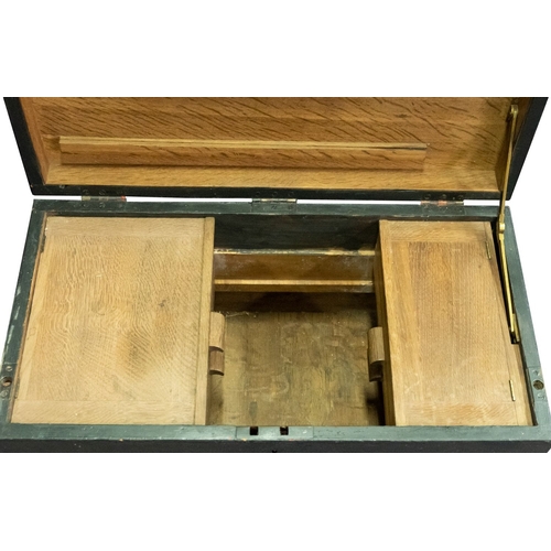 223A - An oak seaman's chest, of traditional form with rope beckets, the interior fitted for tools with sli... 