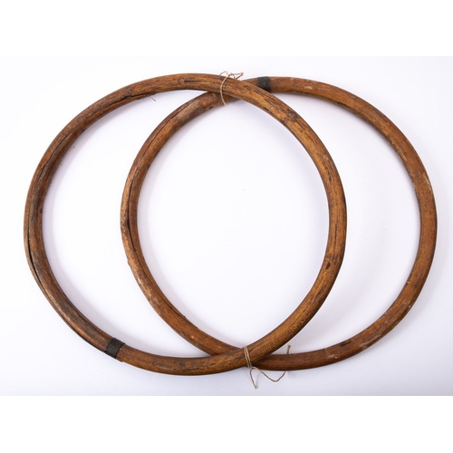 227 - Two bentwood and brass bound mast hoops, 54cm diameter (2)