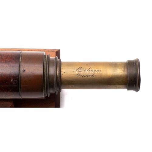 243 - A 19th century mahogany three draw telescope, maker Braham , Bristol, on a later wooden  plinth.