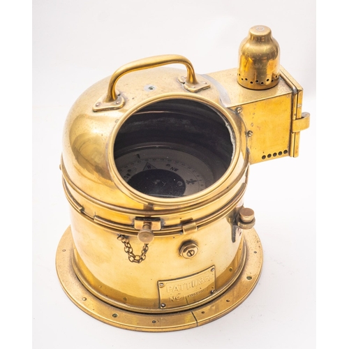 273 - A brass binnacle compass, the 4 inch liquid filled dial in a gimballed mount within a '1183' pattern... 