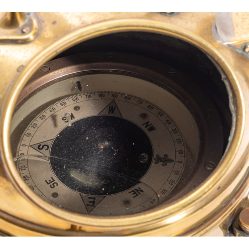 273 - A brass binnacle compass, the 4 inch liquid filled dial in a gimballed mount within a '1183' pattern... 