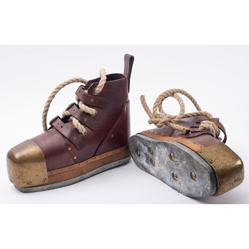 320 - A pair of Siebe Gorman style diver's boots, with lead and oak soles, brass toe caps, and leather upp... 