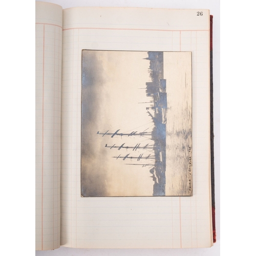 347 - A collection of early 20th century photographs of Tall ships and other shipping in an associated lea... 