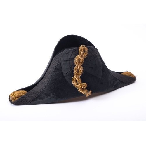 378 - A 19th century Royal Navy Regulation bicorn hat,  the black felt skull with  embroidered trim and gi... 