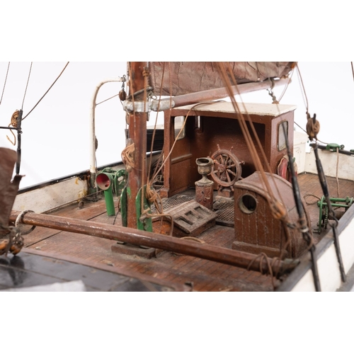 400 - A scale model of the  sailing barge, 'Invicta': fully rigged over a simulated planked deck with whee... 