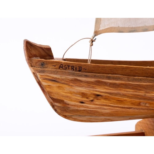 431 - A scale model of a lugger boat 'Astrid' set sail over  planked  hull, raised on a wooden cradle, 41c... 