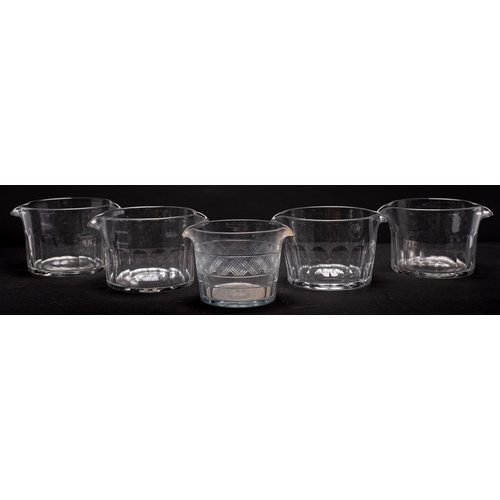 13 - A mixed lot of glassware including nine wine glass rinsers; a pair of mallet shaped decanters and st... 