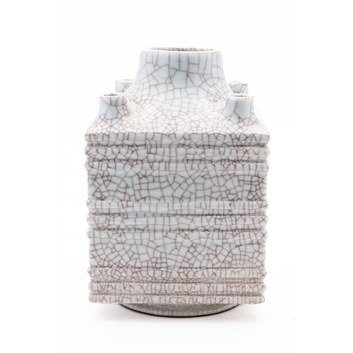 66 - A Chinese Guan-type pale celadon Cong vase, of archaic and ribbed jade form, with short circular foo... 