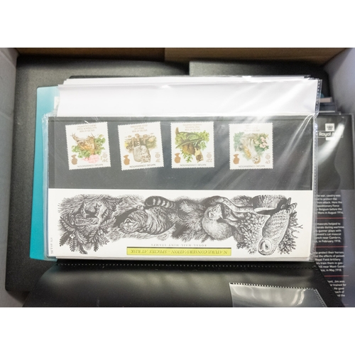 673 - An accumulation of stamps and covers in stockbooks and binders with Great Britain mint decimal issue... 