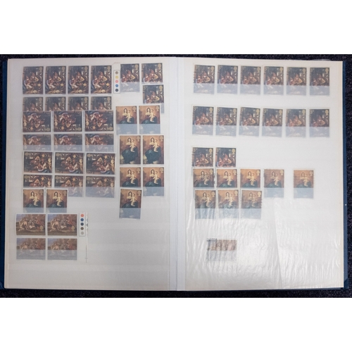 674 - An accumulation of stamps in albums, stock books and loose with mint Great Britain..   .