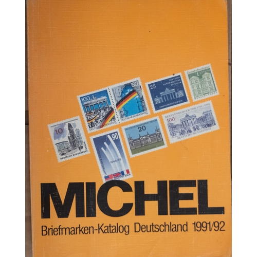 676 - A large accumulation of stamps and covers in albums, stockbooks and loose contained in four boxes wi... 