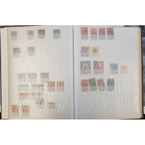 676 - A large accumulation of stamps and covers in albums, stockbooks and loose contained in four boxes wi... 