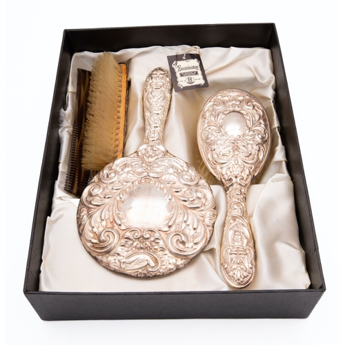 17 - An Elizabeth II silver backed dressing table set by Henry Bushell & Co, Birmingham 1972, comprising ... 