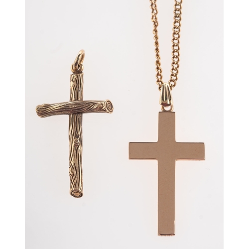 379 - A group of two cross pendants and a chain, including 9ct gold 'tree bark' effect cross pendant, UK h... 