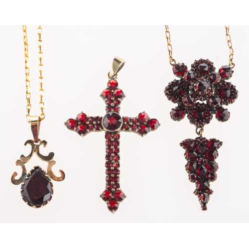 385 - A group of four items of garnet jewellery, including a Victorian Bohemian drop pendant set with a mi... 