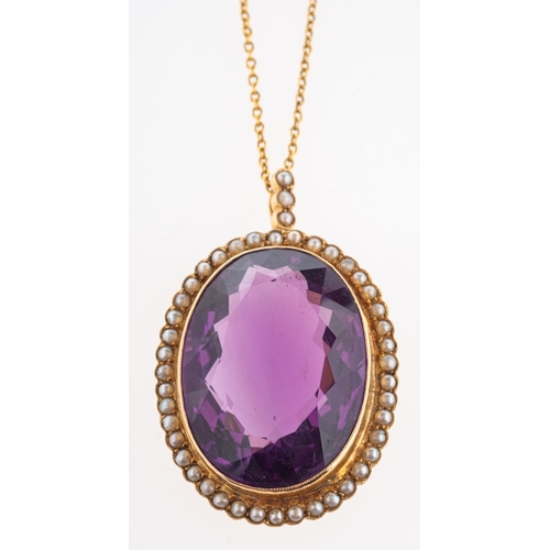 397 - A impressive Victorian amethyst & seed pearl pendant, set with an oval mixed-cut amethyst, approx. 4... 