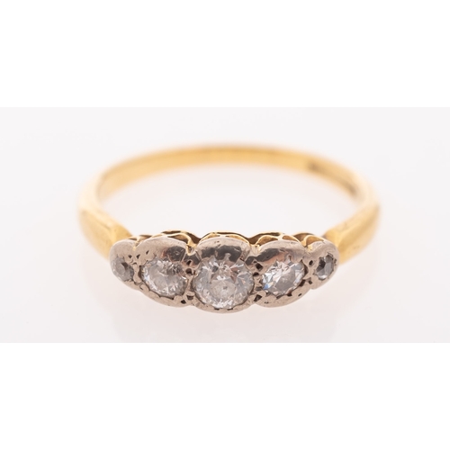 833 - An 18ct gold five stone diamond ring, set with five graduated brilliant-cut diamonds, diamonds appro... 