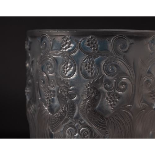 11 - A Lalique vase, Coq et Raisins, the blue stained exterior moulded with cockerels and fruiting vine, ... 