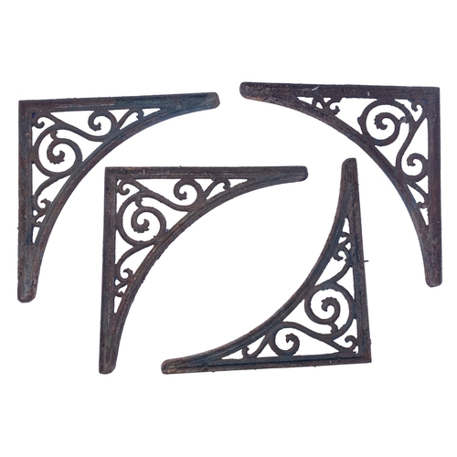 1116 - A group of cast and wrought iron architectural wall brackets and other elements, late 19th /early 20... 