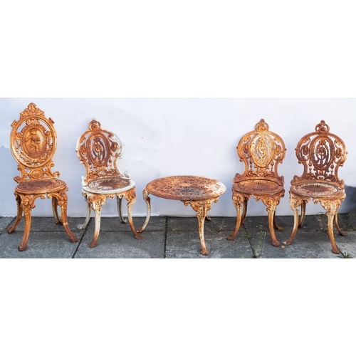 1117 - A set of three Edwardian painted cast iron garden chairs, early 20th century; in Rococo Revival styl... 