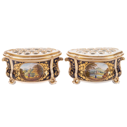 131 - A pair of Derby bough pots and pierced covers of bombé form with acanthus scroll handles and scroll ... 