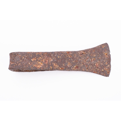 168 - An iron axehead, probably Germanic Celtic, circa 500 AD; with tapered oval socket and flared blade; ... 