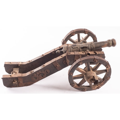 174A - A Continental bronze saluting cannon, probably early 18th century; the tapering multi-stage barrel w... 