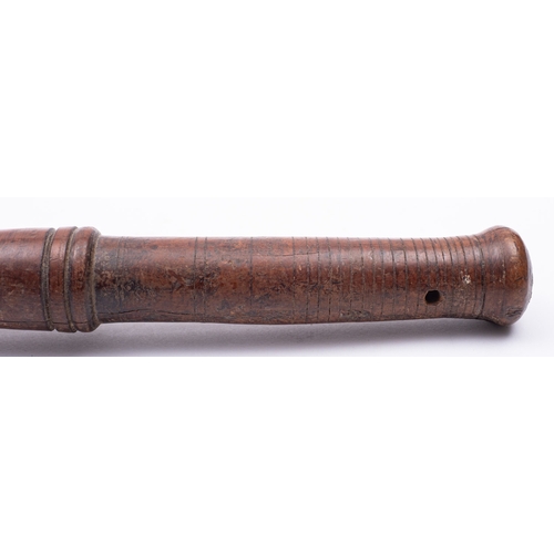 180 - A George III turned hardwood cudgel, early 19th century; with variously knopped finial, shaft and ha... 