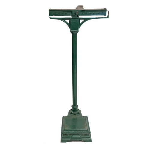 196 - A set of painted cast iron weighing scales, by Avery of Birmingham, early 20th century; with horizon... 