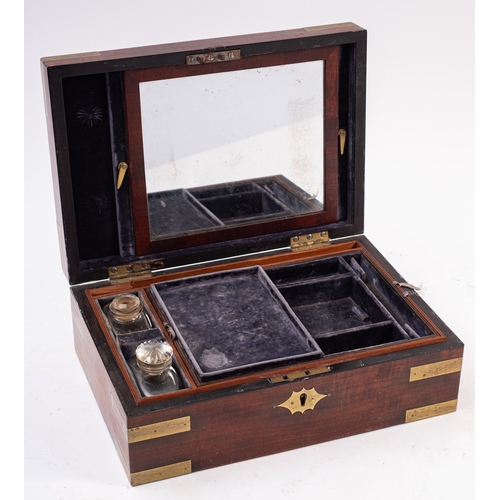 202 - A Regency mahogany and brass bound dressing case, circa 1815; by Chrisp of London; the exterior with... 