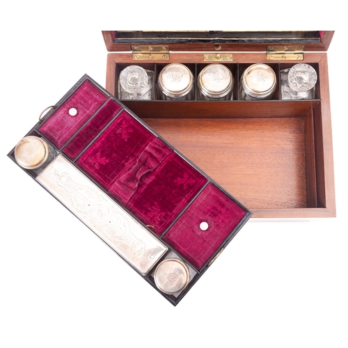 207 - A Victorian mahogany dressing case, third quarter 19th century; the hinged cover with inset monogram... 