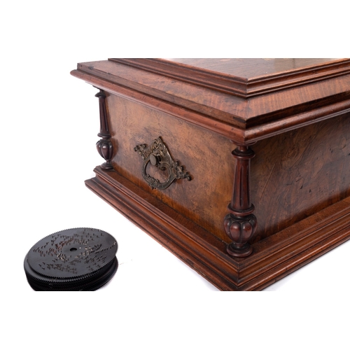 209 - A Continental kingwood, burr walnut and marquetry table top symphonium, circa 1880; the hinged cover... 