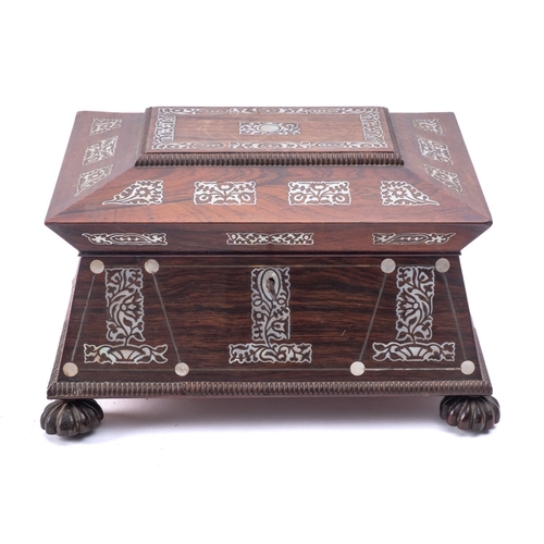 224 - A George IV rosewood and mother of pearl sewing box, circa 1825; of sarcophagus form, with foliate i... 