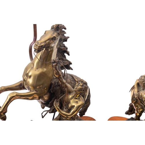 259 - A pair of Continental patinated bronze models of the Marly Horses, late 19th century and later fitte... 