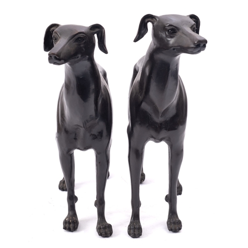 268 - Two modern patinated metal models of greyhounds, late 20th century; naturalistically portrayed, stan... 